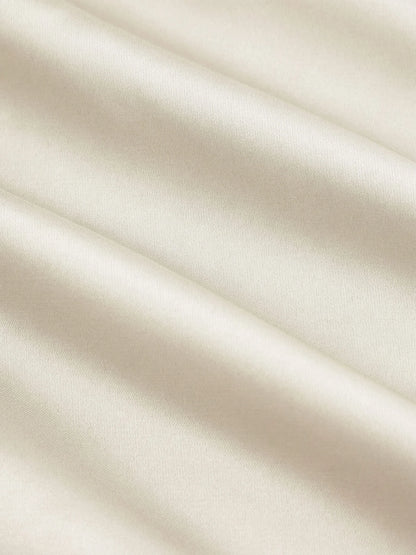 Vestido Maxi A-line con nudo y cuello halter de satén - Crema